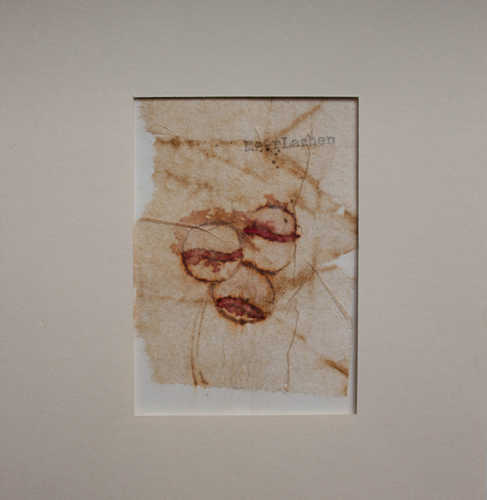 MeerLachen | 2010 | watercolor and typewriter on used teabag
